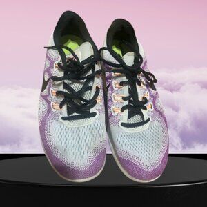 This is a pair of women's Nike Free RN 2017 running shoes in a white and purple